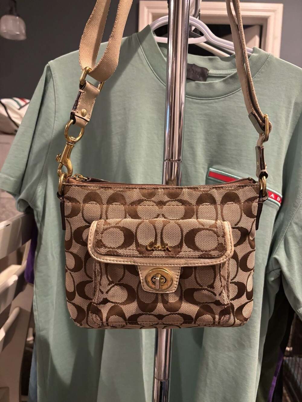 Coach Signature Penelope Turnlock Swingpack Crossbody Bag